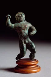 Etruské umění: bronzová soška atleta z Veneziana Fonte. 520-500 před naším letopočtem. Ztlumit. 6 cm Florencie, Museo Archeologico