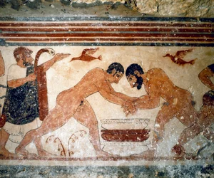 Dva zápasníci. (Detail fresky, 530 př.nl)