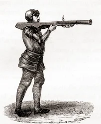 Pěší voják používající ruční bombardování, konec 14. a 15. století, po kresbě z 19. století z Les Merveilles de la Science, publikované kolem roku 1870 (rytina)