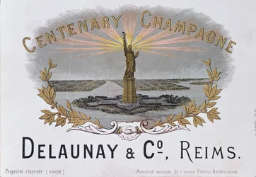 Štítek šampaňského z domu Delaunay & Co. oslavující sté výročí americké nezávislosti a zobrazující Sochu svobody, kolem roku 1876