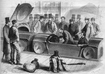 Anglie 1865: London Air Railway. Vévoda z Buckinghamu a několik členů společnosti zahájili pneumatickou cestu. Rytina z roku 1865.