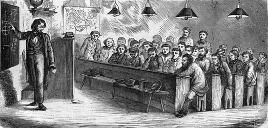 Večerní třída na veřejné škole pro dospělé v Paříži v roce 1858.