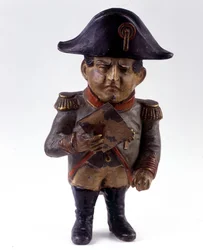 Figurka používaná jako prasátko s podobiznou Napoleona I. Soška z 2. poloviny 19. století. Sbírka vojákům včerejška.