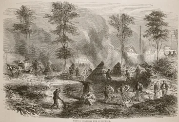 Výroba dřevěného uhlí pro střelný prach, ilustrace z Cassells Historie války mezi Francií a Německem, 1870-1871