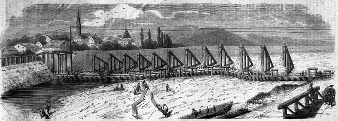 Meteorologický jev: vysychání Rýna v roce 1858. Pohled na most Kehl (Německo), pořízený po proudu od francouzského pobřeží. Rytina v „“ Le Monde Illustré““ č. 50 z 27. března 1858.