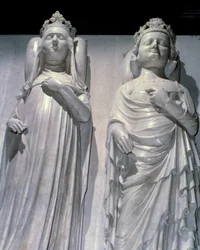Mramorová ložiska královny Johanky z Evreux (1307-1371) a krále Karla IV. Le Bel (1294-1328). Je to stejný model jako Maubuisson, vyrobený na objednávku královny Jeanem de Liege (známý kolem 1357-1381). Bazilika Saint Denis, královská nekropole.