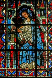 Okno w202 zobrazující svatého Jana píšícího evangelium