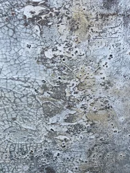 Abstraktní obraz s popraskanou texturou