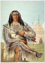 Američtí Indiáni: Portrét vůdce kmene černonožců (černé nohy) ve věku kolem 50 let. Ilustrace George Catlin (1794-1872)