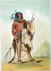 Američtí Indiáni: portrét indiánského náčelníka, který se stal lékařem a drží tam-tam (tam-tam), v němž jsou léky. Ilustrace George Catlina (1794-1872)