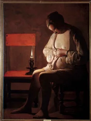 Žena má čip. Obraz od Georgese De La Tour (1593-1652)