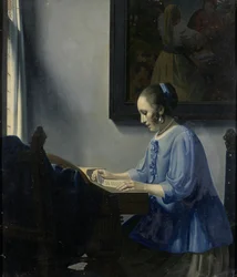 Žena čtoucí hudbu