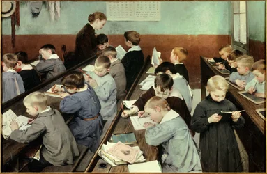 Ve třídě práce těch nejmenších. Mladí chlapci ve školní blůze studují ve třídě, někteří čtou, jiní píší do sešitu nebo na tabulky. Obraz Jean Henri Jules Dit Geo Geoffroy (1853-1924)