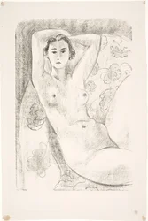 Ženský model sedící v křesle