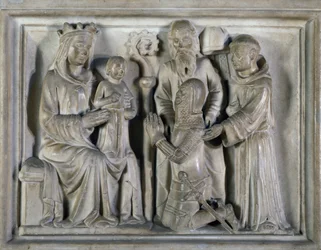 Madonna s dítětem, s válečníkem a světci, reliéf vytvořený mistry Campione. Itálie