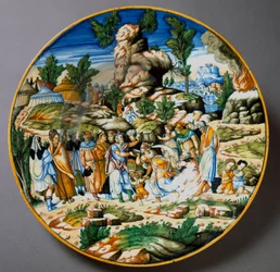 Mojžíš nechává vytrysknout vodu ze skály a dává napít izraelskému lidu. Keramický talíř vyrobený v Urbinu v dílně Fontana, Itálie. Kolem roku 1560, Florencie, Museo Nazionale del Bargello