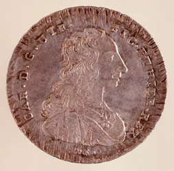 Stříbrná Piastra z Neapole: Vláda Karla III Španělska (1716-1788) a Portrét. 1750. Průměr. 4 cm Neapol, archeologické muzeum