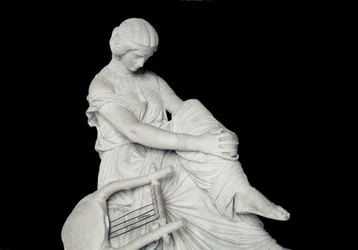 Sapfó (nebo Sapho, 7. století př. n. l.), řecká básnířka starověku. Mramorová socha od Jamese Pradiera (1790-1852)