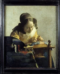 Krajkářka. Obraz Jana (Johannese) Vermeera z Delftu (1632-1675), kolem let 1658-1660. Rozměry: 0,24 x 0,21 m. Muzeum Louvre.