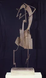 Žena aranžující si vlasy, 1929-30 (metal)