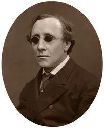 Henry Fawcett, MP, profesor politické ekonomie na Cambridge University, 1876.
