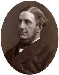 Sir William Vernon Harcourt, korunní advokát, poslanec, profesor mezinárodního práva na Cambridgeské univerzitě, 1877.