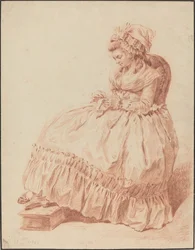 Sedící žena šití