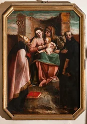 Janov, Duomo (katedrála svatého Vavřince), uvnitř, Baptisterium (dříve kostel svatého Jana Starého): "Madona s dítětem mezi svatou Annou, svatým Mikulášem z Bari a svatým Mikulášem z Tolentina", Luca Cambiaso
