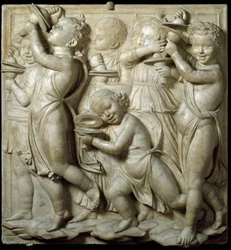 Panel Cantoria nebo tribuna zpěváků: dítě hrající na činely. vysoký mramorový reliéf od Luca della Robbia (asi 1400-1482) 1431-1438 Rozm. 348 cm Museo dell