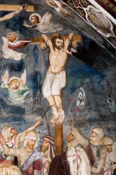 Nelitovaný zloděj, ukřižován s Ježíšem, jeho duše je vytržena z úst démonem Představení zlého zloděje, kterému říká Gesmas nebo Gestas. Freska od mistra Sacro Speco. 14. století. Vyšší církev. Klášter Saint Benedetto (Sacro Spec