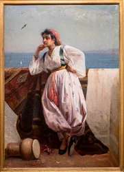 Mladá orientální dívka na terase v Alžíru