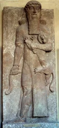Mezopotámie: socha Sargona ovládajícího lva, zvaná Gilgameš, dvůr v Chorsabadu, 8. století. Paříž, muzeum Louvre