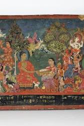 Detail z obálky buddhistického rukopisu (neprůhledné wc na dřevě)