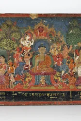 Detail z obálky buddhistického rukopisu (neprůhledné wc na dřevě)