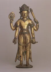 Soška hinduistického boha Višnua, cca 1200 (vysokoměděný bronz, vyřezávaná, zlacená, osazená drahokamy a malovaná)