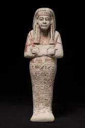 Ushabti pro ženu jménem Wia, Ramesside Period (vápenec)