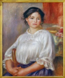 Mladá dívka sedící