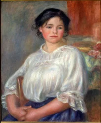 Mladá dívka sedí