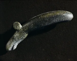 Pravěk: dioritový nástroj ve tvaru losa. Doba kamenná. Švédské historické muzeum, Stockholm, Švédsko