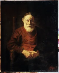 Portrét starého muže v červené barvě. Obraz Harmenszoona van Rijna známý jako Rembrandt (1606-1669)
