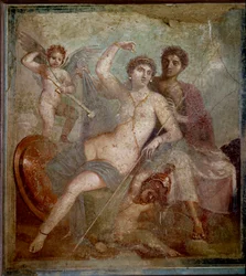 Zobrazení Área a Afrodity v doprovodu erótů hrajících si se zbraněmi boha. Freska z Vily Marta a Venuše v Pompejích. 1. století n. l. Archeologické muzeum v Neapoli - Římské umění: Áres, Afrodita a Erós. Afrodita (Venuše), ležící