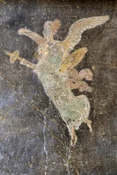 Freska s okřídlenou postavou, pravé křídlo v Domě Vettii, Pompeje (Seznam světového dědictví UNESCO