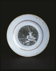 Bílý talíř lemovaný zlatou a červenou ženou (porcelán)