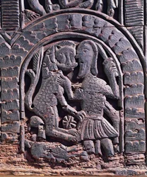 Detail lovu lva ze středověké truhly (dřevo)