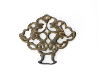 Ornament s párem lvů, dynastie Seljud, možná 13. století (bronz se stopami zlacení)