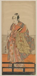 Kabuki herec Ichikawa Monnosuke II držící helmu a róbu Gagaku Dancers, období Edo, cca 1780 (barevný dřevotisk)