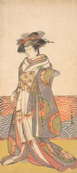 Třetí Segawa Kikunojo jako žena stojící v místnosti s vlnovým vzorem Dado, ca. 1779.