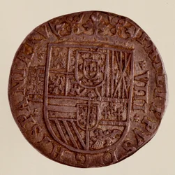 Stříbrná mince (8 realů) ze Španělska: vláda Filipa (Filippo nebo Filip) II (1556-1598). 1589 Prům. 3,5 cm Neapol, museo archeologico