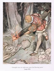 Přímo do jeho pravého oka šel bod plamene (barva litho)