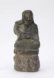 Malá socha buddhistického kněze